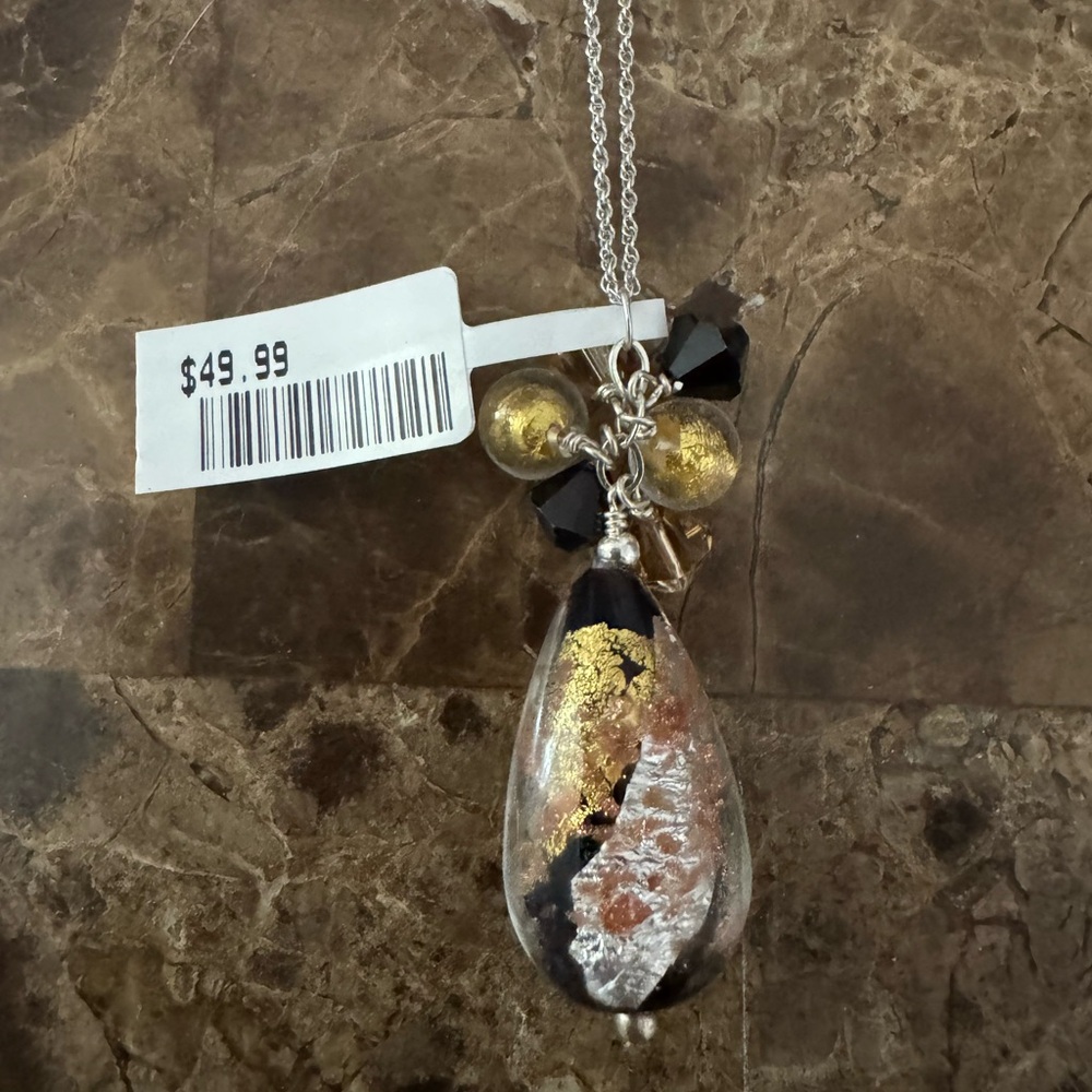 Elegant Gold and Silver Pendant Necklace